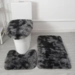 Plush bathroom rug set with toilet lid cover and mat in a cozy bathroom