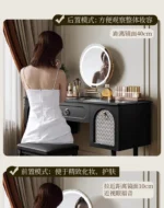 Goldoma compact vanity desk with drawer storage and mirror in a corner bedroom setting