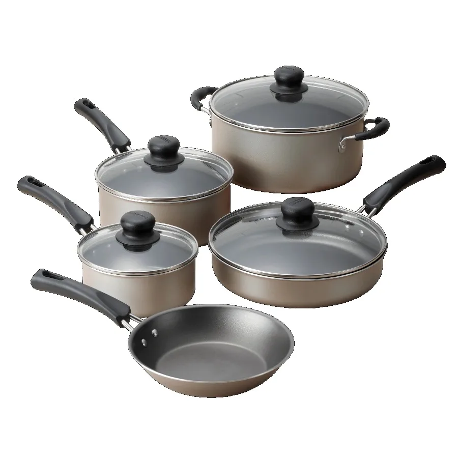 Tramontina 9-piece nonstick cookware set in champagne color on a modern kitchen countertop