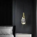 Modern crystal pendant lamp illuminating a dining room with elegant light refraction