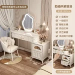 Modern wood makeup vanity table with mirror, drawer, and stool in a bedroom setting