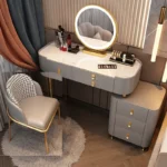 Modern dressing table with mirror and stool in a minimalist bedroom setup