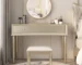 Cherry wood dressing table with mirror and stool in a modern bedroom