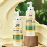 WK JALY lotion bottle next to fresh carrots, highlighting natural carrot oil ingredient