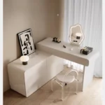 White minimalist wood dresser with mirror and stool in modern bedroom setting