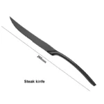 Luxury black 18/10 stainless steel cutlery set arranged on a table