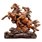 Horse statue on wine cabinet, black resin, with zodiac symbols etched on the cabinet surface.