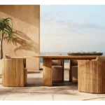 Oval solid wood dining table with teak top and aluminum base in French style