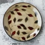 Ceramic dinnerware set with Japanese flat serving plates in floral Nordic design