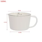 Enamel baking measuring cup with dual scale markings on a kitchen counter