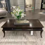 Minimalist coffee table with metal frame in a modern living room setting, Goldoma
