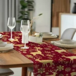Christmas table runner with elk pattern on a dining table