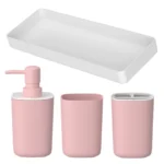 Set of pink bathroom accessories with a spa-like ambiance, soft lighting.