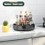 Goldoma rotating spice rack filled with spice jars on a kitchen counter