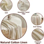 Round linen tablecloth with tassels on a dining table
