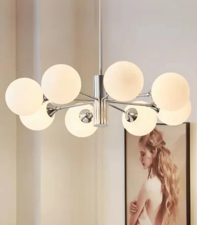 Nordic designer multi-head glass LED chandelier in a modern living room, warm light illuminating the space.