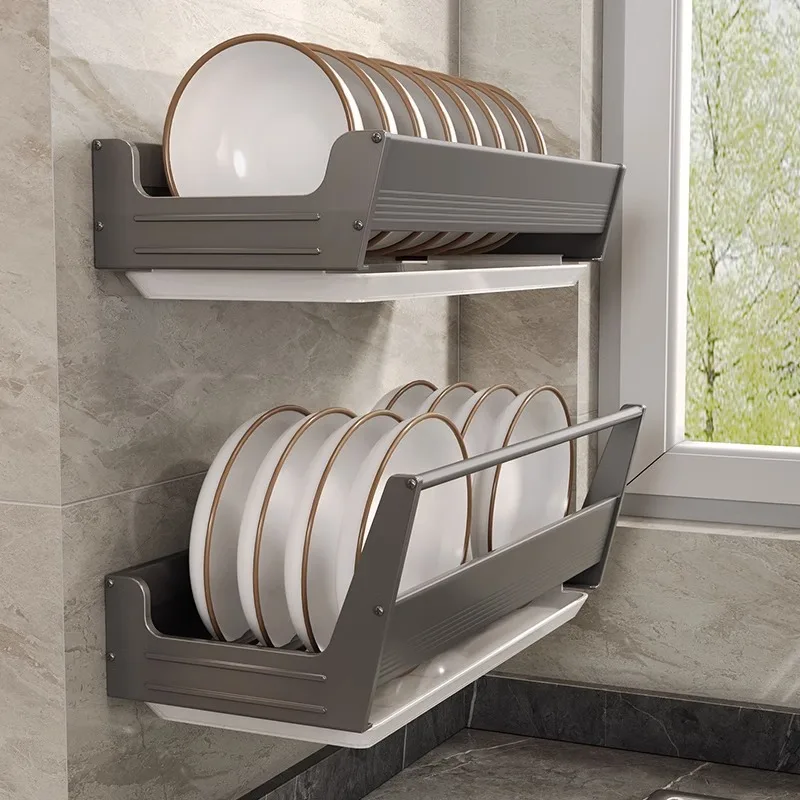 Sfa7476095c584da5baadb444fffc9c22L.webp Stainless steel wall mounted dish rack holding plates and bowls in a modern kitchen