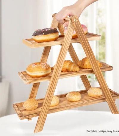 Wooden cupcake stand with three tiers of detachable rectangle platters displaying cupcakes and desserts