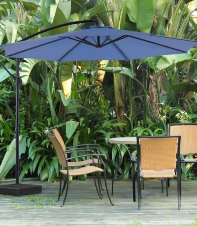 10FT cantilever patio umbrella with offset hanging and UV protection in a backyard garden