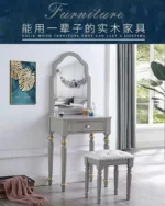 Modern white dressing table with mirror and stool in a bedroom setting