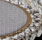 Luxury crystal chandelier illuminating a modern living room with sparkling light