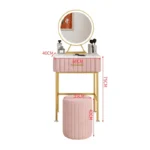 Marble top dressing table with lighted mirror and stool in a bedroom setting