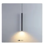 Modern pendant light with double cylindrical shades in a Nordic dining room setting