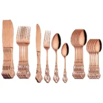 24-piece stainless steel cutlery set with gold handles displayed on a wooden table