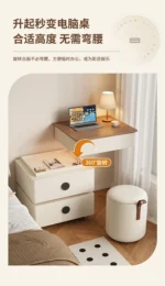Modern lifting vanity table with mirror in cream finish, featuring rotating top and adjustable height for bedroom use