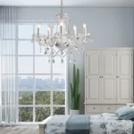 Elegant crystal chandelier illuminating a modern living room with sparkling light