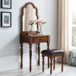 Classic solid oak makeup vanity table with mirror and drawer in a bedroom setting