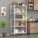 Foldable kitchen shelf with multilayer iron frame in a modern kitchen displaying dishes and spices
