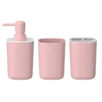 Pink tray holding soap dispenser, toothbrush holder, and wash cup together.
