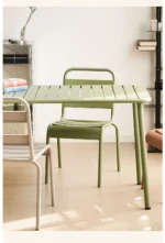 Outdoor Metal Dining Table – Simple Waterproof Table for Patio & Garden – in a cozy room setting