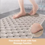 Oblong non-slip bath mat with suction cups on shower floor