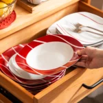 MALACASA Felisa red stripe dinnerware set arranged on a dining table