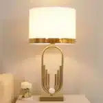 Modern table lamp with fabric shade in a cozy living room setting