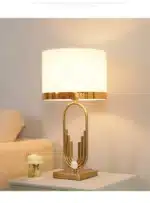 Modern table lamp with fabric shade in a cozy living room setting