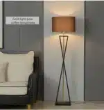 Modern floor lamp with iron frame and fabric shade in a contemporary living room