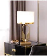 Modern table lamp with fabric shade in a cozy living room setting