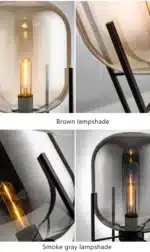 Modern floor lamp with iron frame and glass shade in a cozy living room