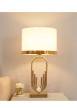Modern table lamp with fabric shade in a cozy living room setting