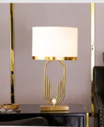 Modern table lamp with fabric shade in a cozy living room setting