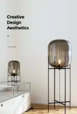 Modern floor lamp with iron frame and glass shade in a cozy living room