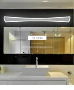 Modern wall sconce with white iron and acrylic shade in a contemporary bathroom
