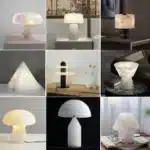 Elegant marble table lamp with soft glow on bedside table in bedroom