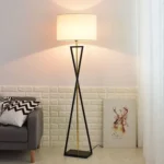 Modern floor lamp with iron frame and fabric shade in a contemporary living room