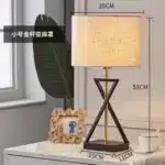 Modern floor lamp with iron frame and fabric shade in a contemporary living room