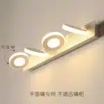 Round LED wall lamp with acrylic shade in a modern living room