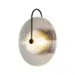 Modern wall lamp with minimalist Nordic design illuminating a cozy bedroom bedside